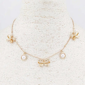 Gold Pearl Bow Charm Necklace