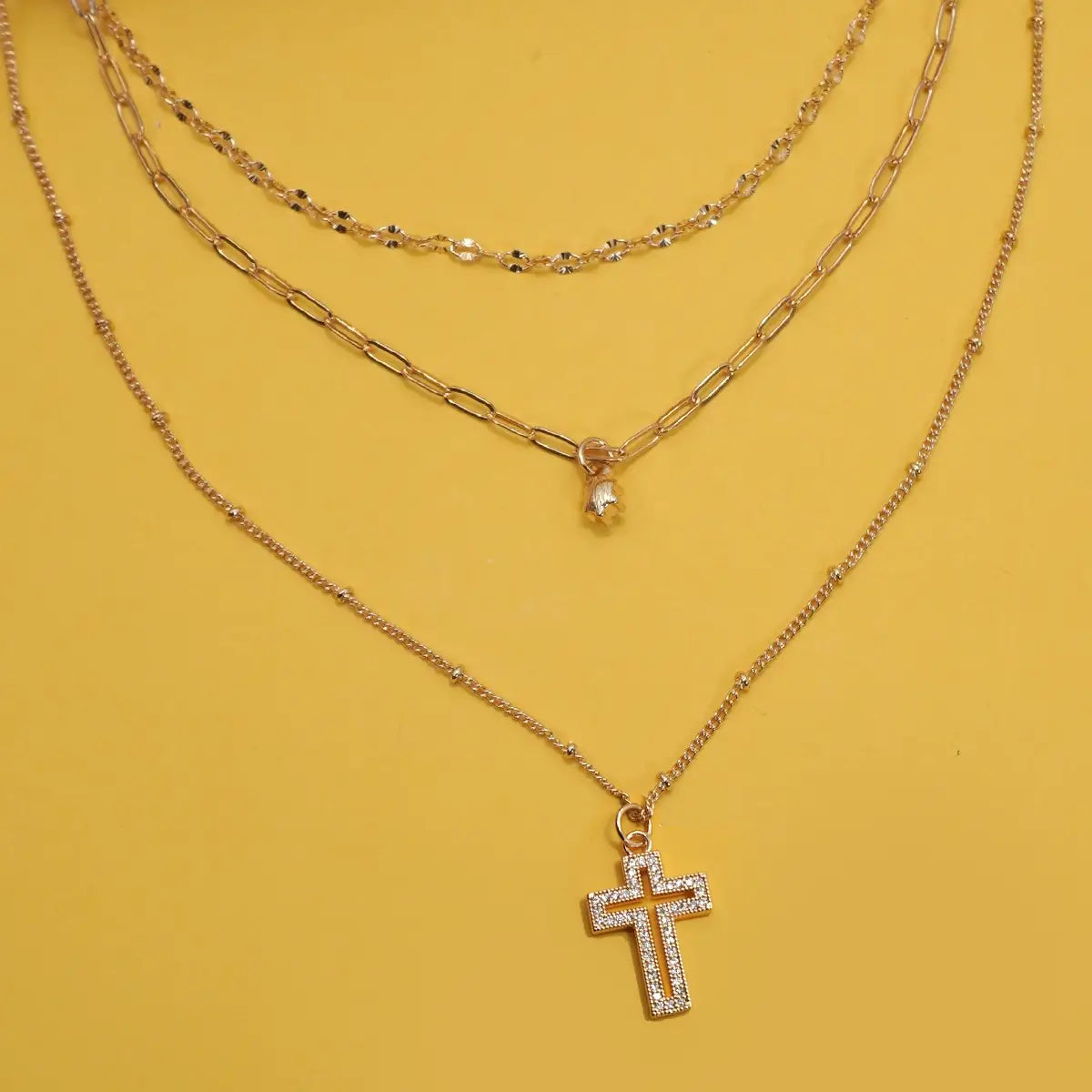Gold Tri-Layered Rhinestone Cross Necklace