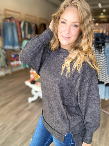 Black Exposed Seam Sweater