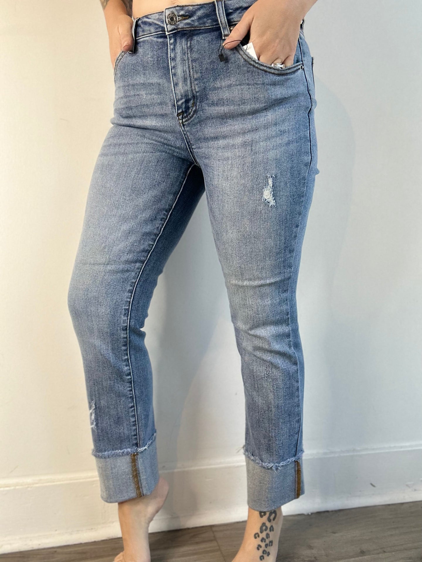 Risen Mid Rise Raw Hem Slim Jeans